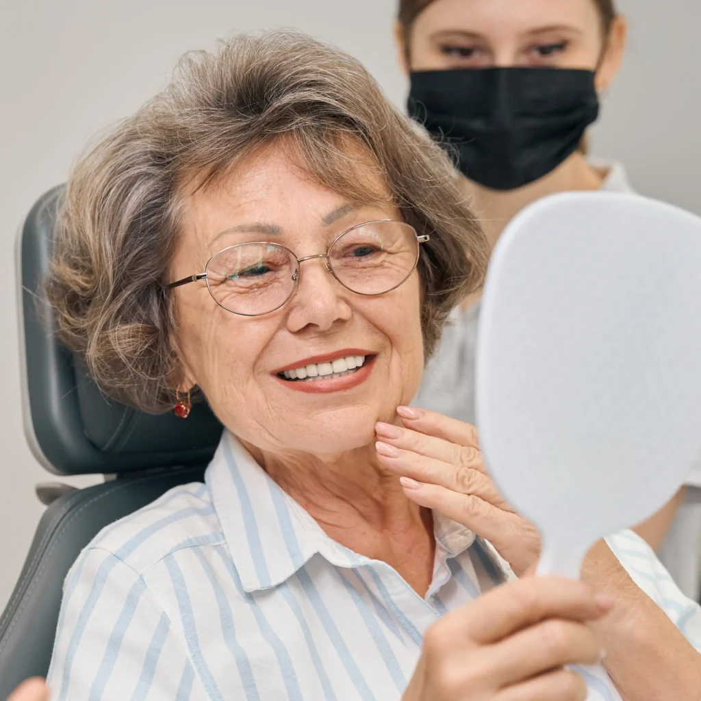 Older woman with dental implants